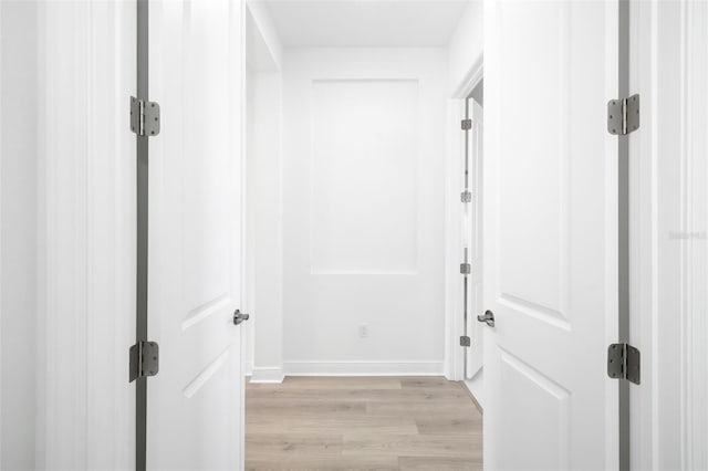 hallway featuring light hardwood / wood-style floors