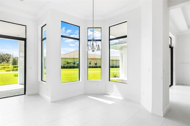 unfurnished dining area with light tile patterned flooring, ornamental molding, and a chandelier