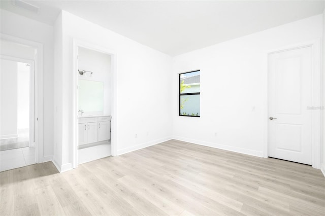 empty room featuring light hardwood / wood-style floors