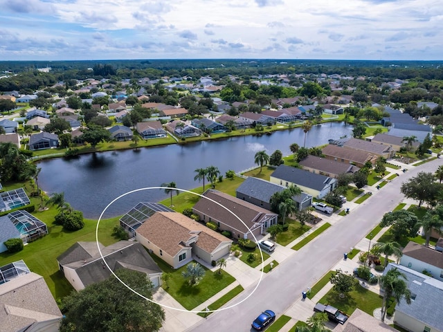 drone / aerial view with a water view