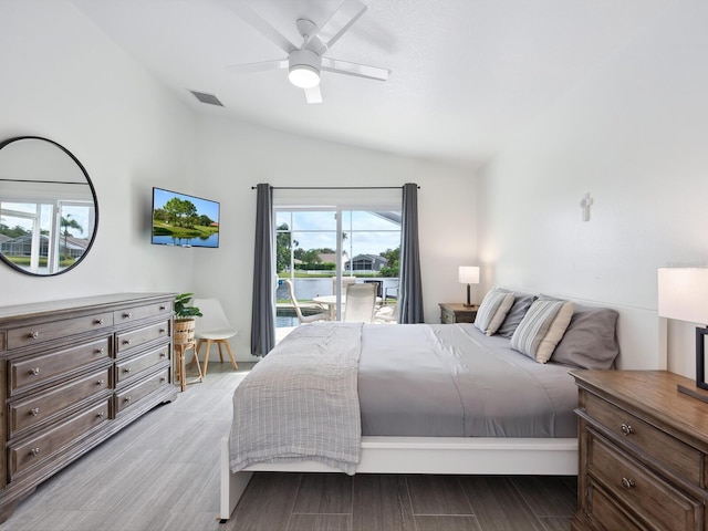 bedroom with multiple windows, ceiling fan, and light hardwood / wood-style flooring