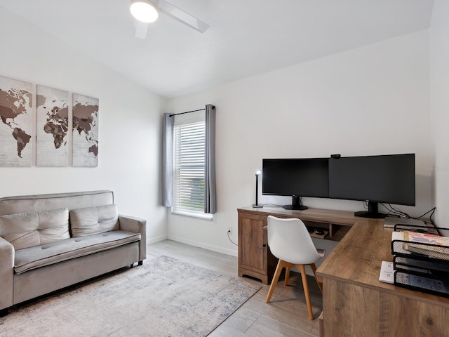 office with lofted ceiling, light hardwood / wood-style floors, and ceiling fan