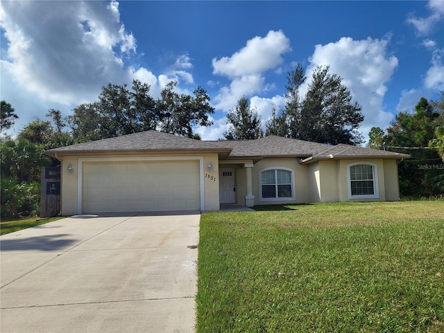 ranch-style home with a front lawn and a garage