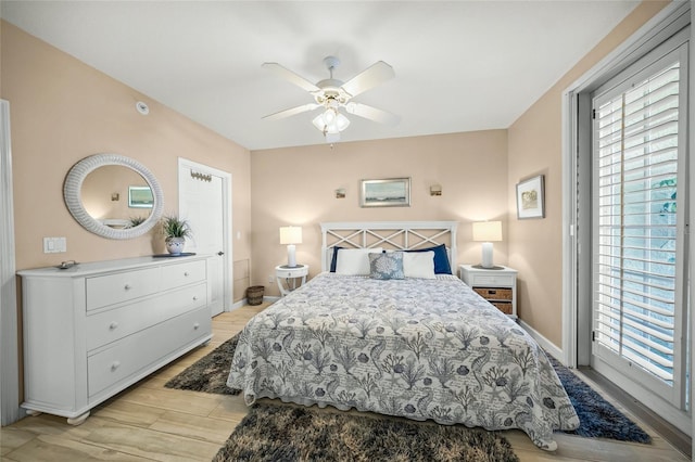 bedroom featuring ceiling fan and light wood-type flooring