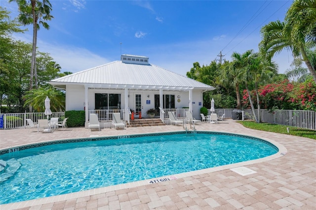 view of pool featuring a patio area