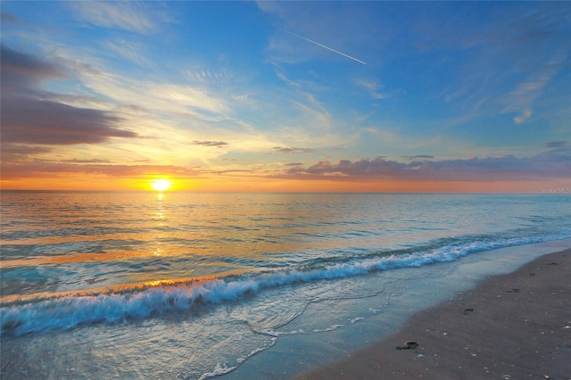 property view of water featuring a beach view