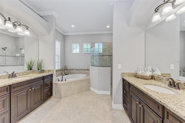 bathroom with crown molding, independent shower and bath, and vanity