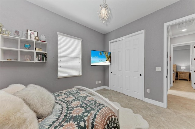 bedroom featuring a closet and light tile patterned floors