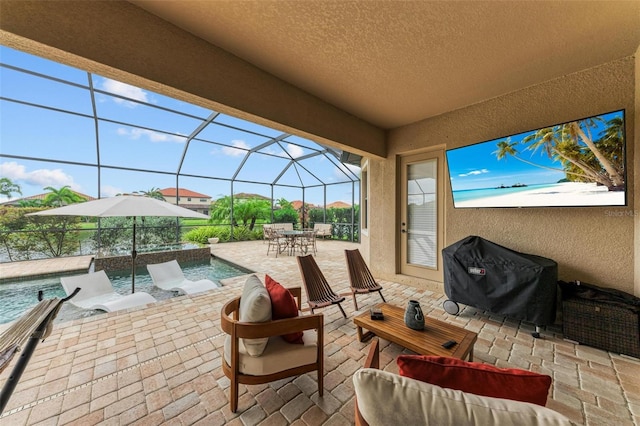 view of patio / terrace featuring a lanai