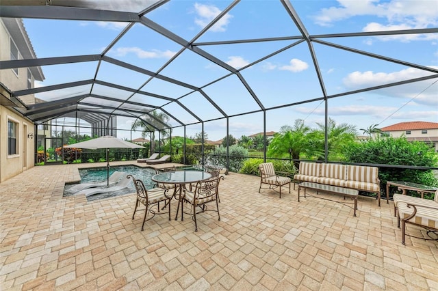 view of patio with a lanai