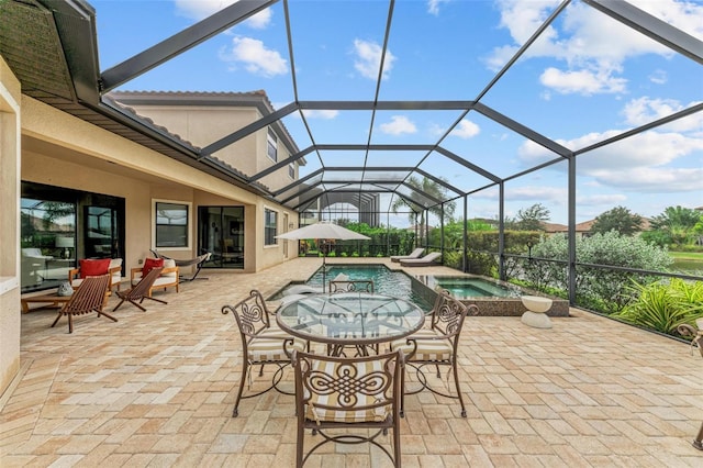 view of patio / terrace with glass enclosure and a swimming pool with hot tub