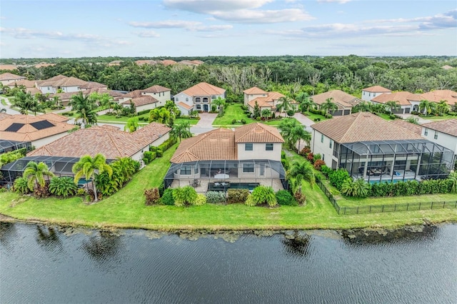 birds eye view of property featuring a water view