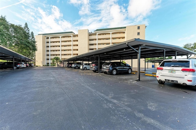 view of vehicle parking featuring a carport