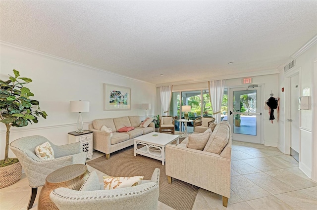 tiled living room with crown molding and a textured ceiling