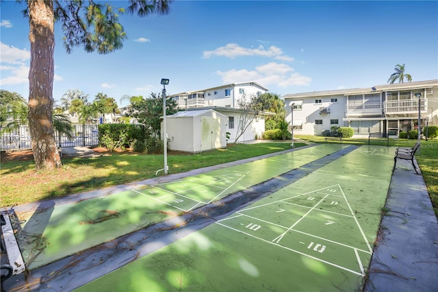 view of community with a yard