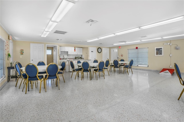 dining room with a healthy amount of sunlight