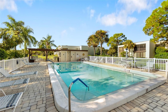 view of swimming pool with a patio area