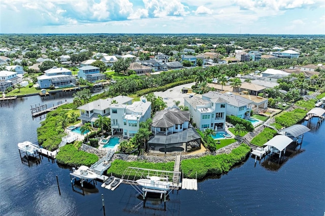 drone / aerial view featuring a water view