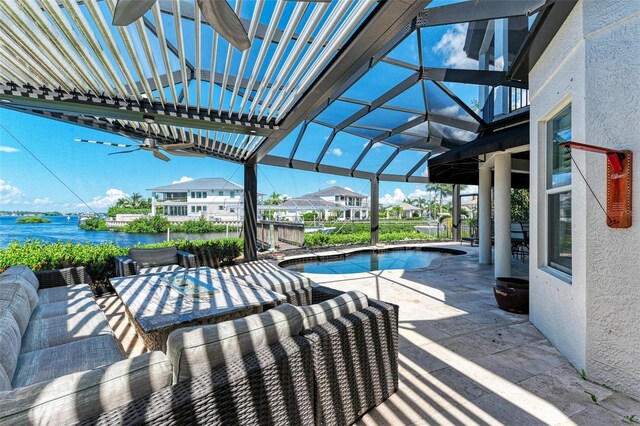 view of patio / terrace featuring a pergola, a water view, an outdoor living space, glass enclosure, and ceiling fan