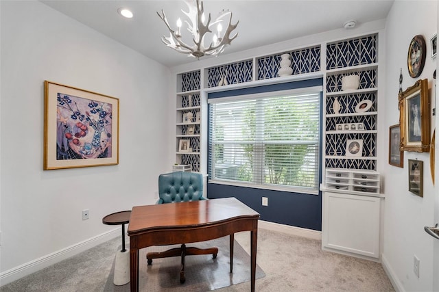 office featuring a chandelier and light colored carpet