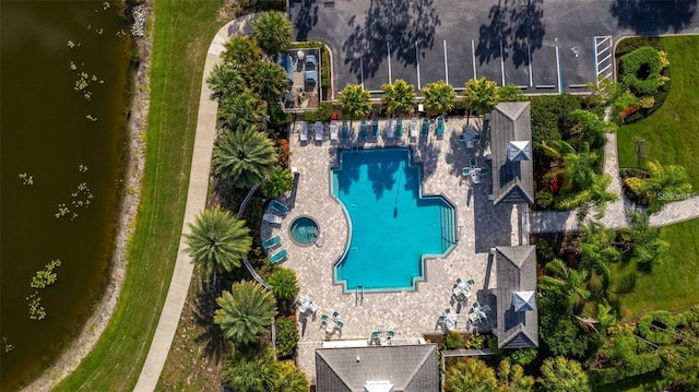 birds eye view of property featuring a water view