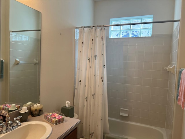 bathroom featuring shower / bath combination with curtain and vanity