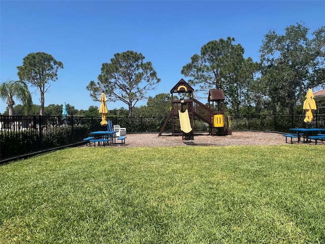 view of play area with a yard