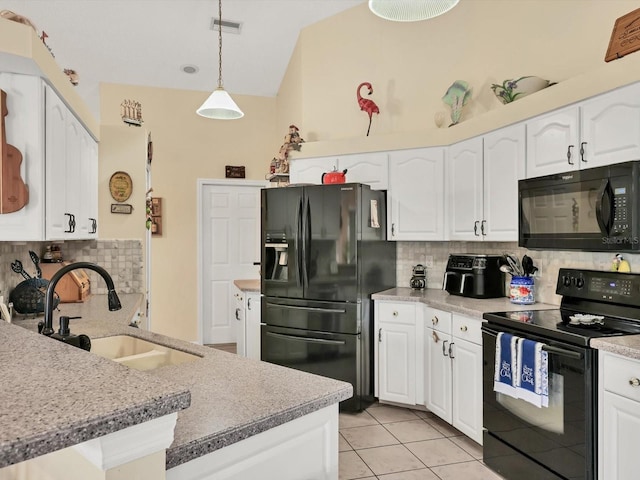 kitchen with black appliances, sink, decorative backsplash, decorative light fixtures, and white cabinetry