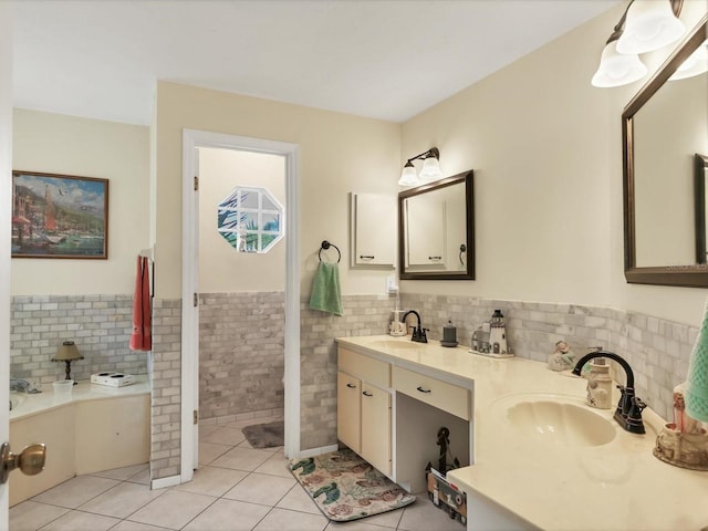 bathroom featuring vanity, tile patterned floors, and tile walls