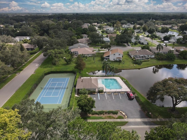 drone / aerial view with a water view