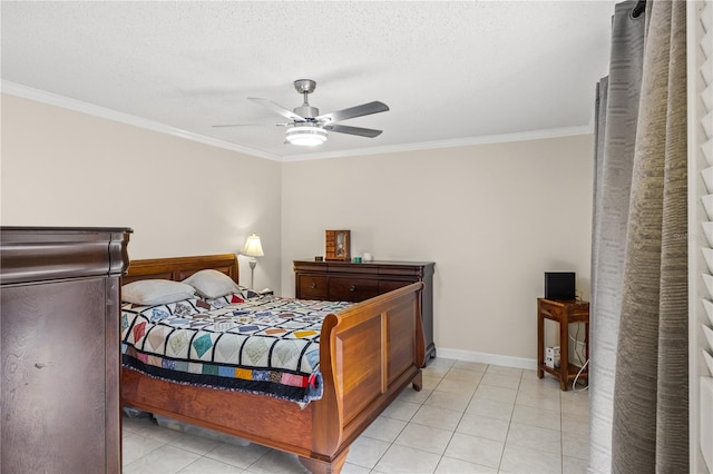 tiled bedroom with ceiling fan, a textured ceiling, and ornamental molding