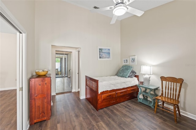 bedroom featuring ceiling fan and dark hardwood / wood-style floors