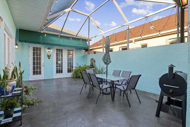 view of patio with a lanai