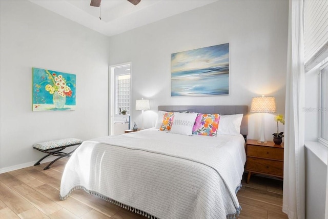 bedroom featuring ceiling fan and light hardwood / wood-style flooring