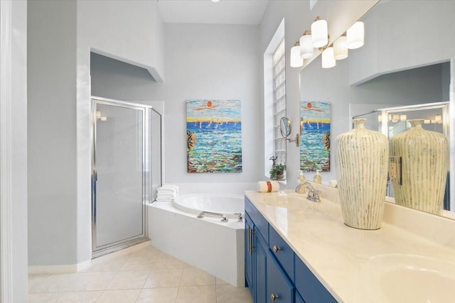 bathroom with shower with separate bathtub, tile patterned flooring, and vanity