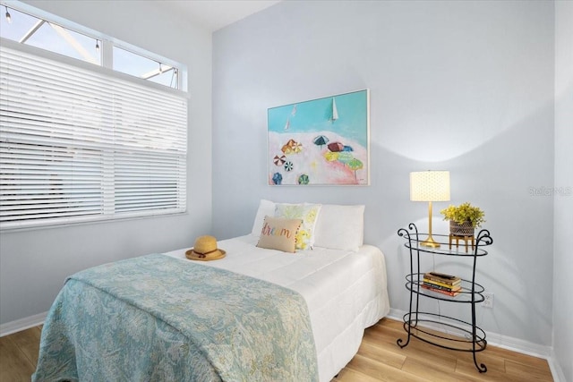 bedroom featuring wood-type flooring