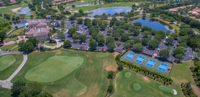 bird's eye view with a water view