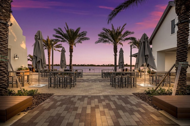 view of patio terrace at dusk