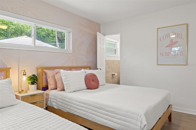 bedroom featuring wood-type flooring