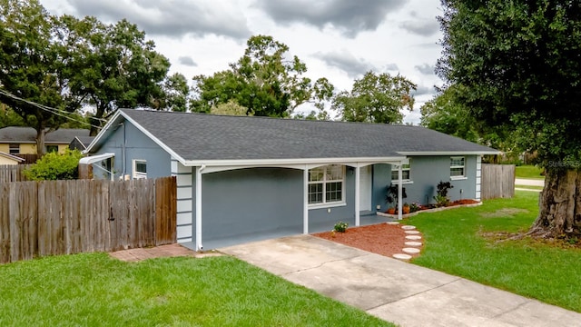 single story home featuring a front lawn