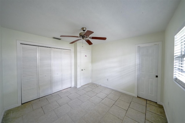 unfurnished bedroom with ceiling fan