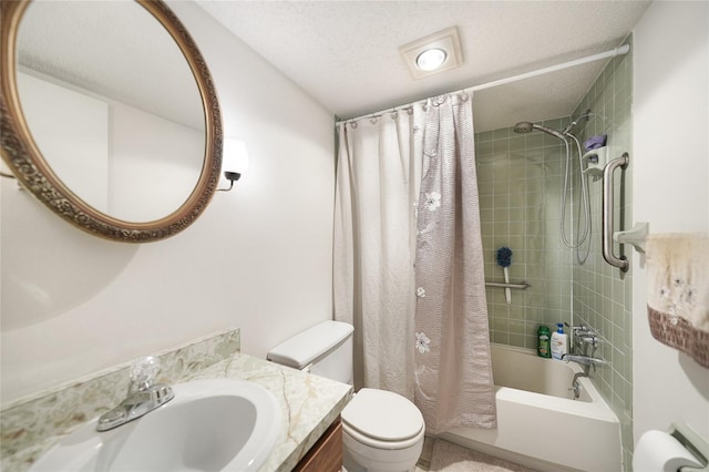 full bathroom with vanity, toilet, a textured ceiling, and shower / tub combo with curtain