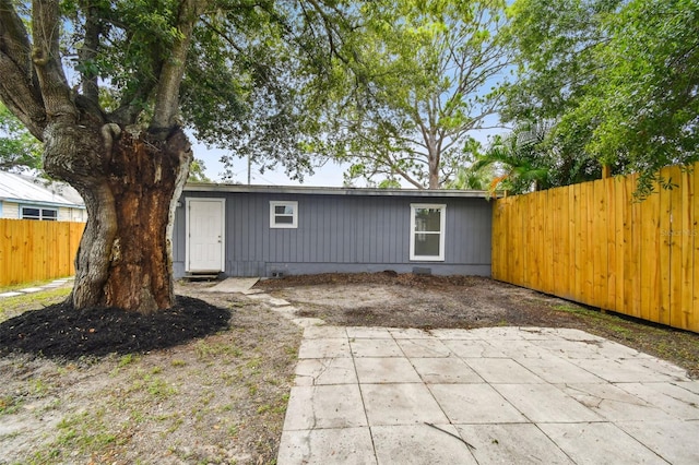 rear view of house featuring a patio area