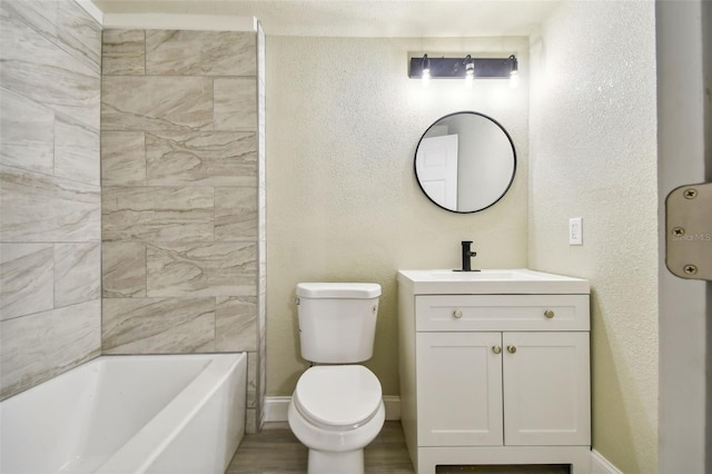 bathroom featuring hardwood / wood-style flooring, vanity, and toilet