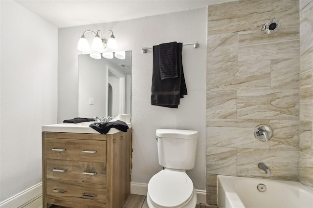 3419 19th St E, Bradenton, FL 34208 - bathroom featuring bathtub / shower combination, toilet, vanity, baseboards, and a notable chandelier
