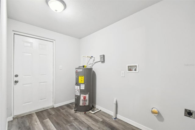 laundry area with washer hookup, hookup for an electric dryer, water heater, and dark hardwood / wood-style floors