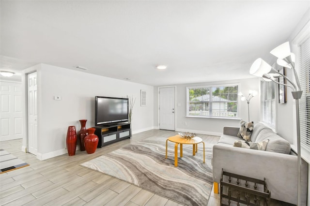 living room with light hardwood / wood-style floors