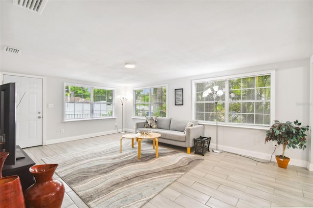 living room with light hardwood / wood-style flooring