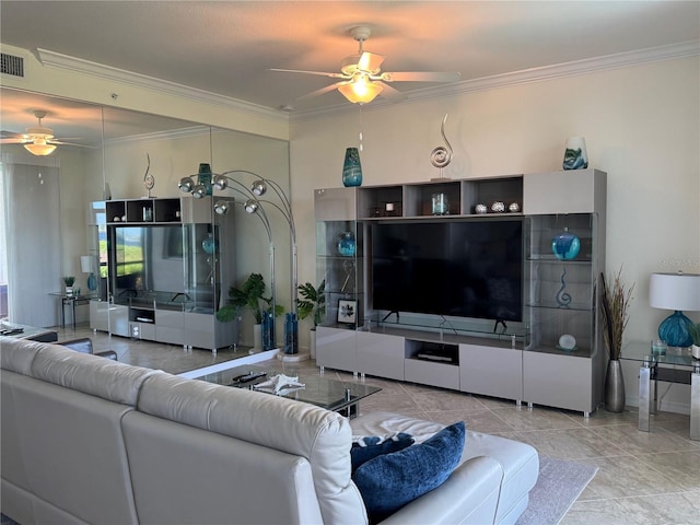 tiled living room featuring ceiling fan and ornamental molding