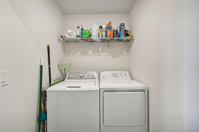 laundry room with washer and dryer